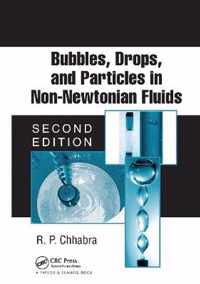 Bubbles, Drops, and Particles in Non-Newtonian Fluids