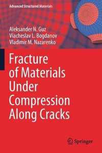 Fracture of Materials Under Compression Along Cracks