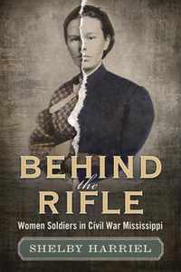 Behind the Rifle