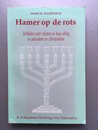 Hamer op de rots